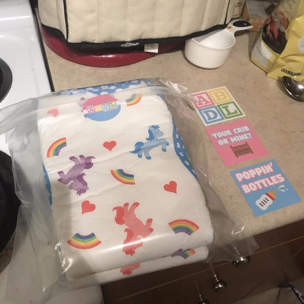 @prince.tommy is loving his new Rainbow Pride diapers and sticker pack! Get yours today at ABDLCompany.com